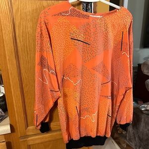 Vibrant Orange Patterned Blouse 1980s Style